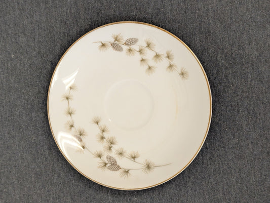 Vintage Mikasa Sequoia fine china saucer with pinecone pattern and gold rim.