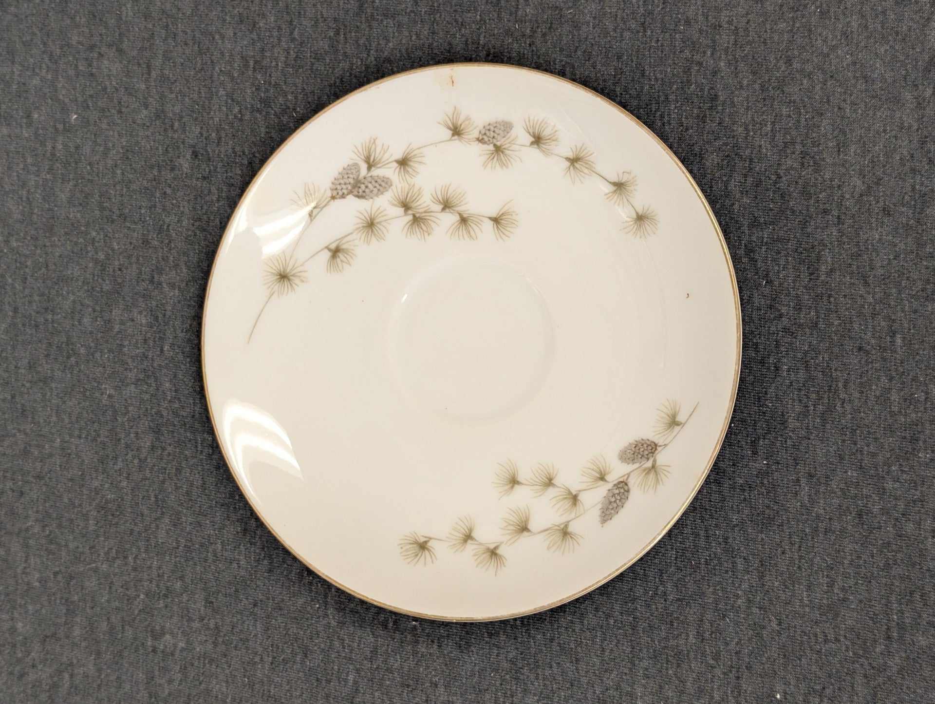 Mid-century Mikasa Sequoia fine china saucer with pinecone accents.