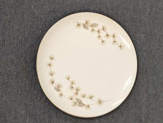 Vintage Mikasa Sequoia dinner plate featuring a pinecone design and gold trim on white fine china.