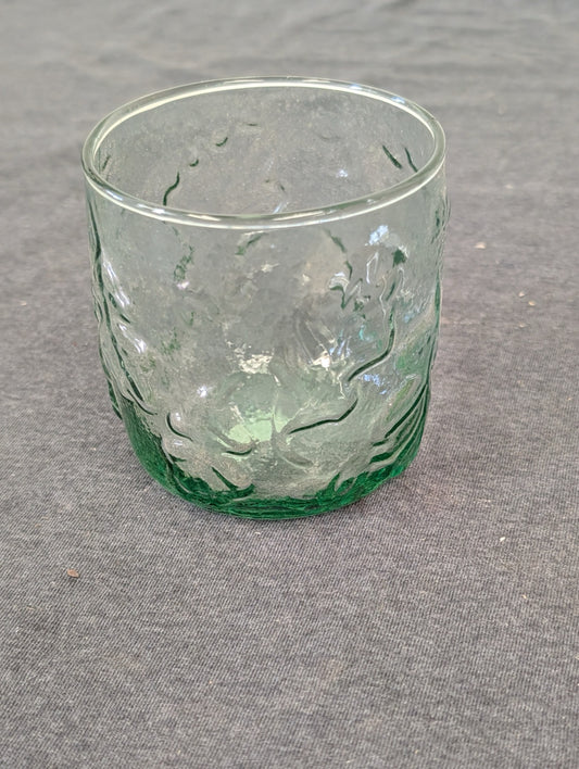 Short green glass tumbler with organic textured bark pattern
