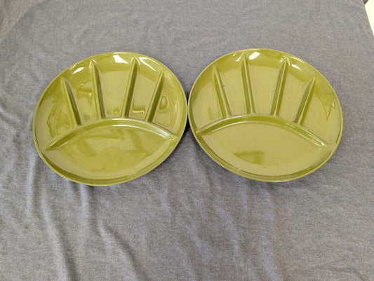 Two green vintage lacquerware divided plates with multiple compartments.