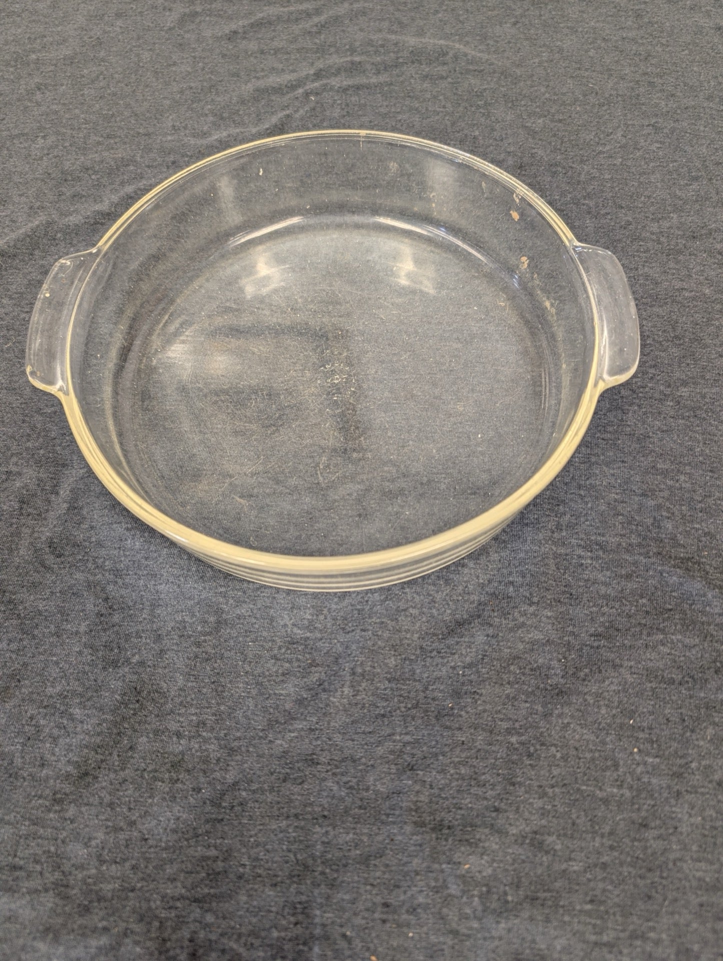 Vintage clear glass round casserole dish with dual side handles
