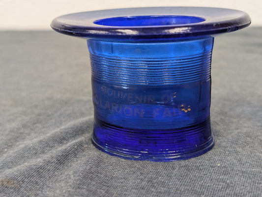 Cobalt blue glass top hat shape etched with Souvenir of Clarion Fair.