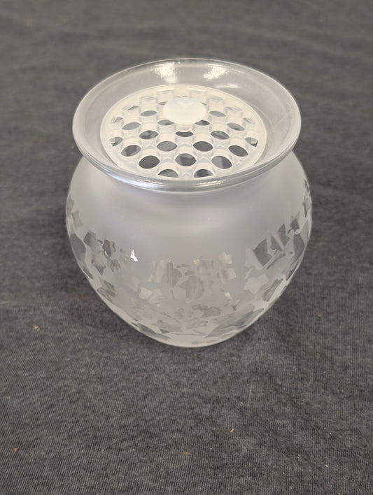 Frosted glass bowl with clear glass flower frog top featuring etched ivy patterns.