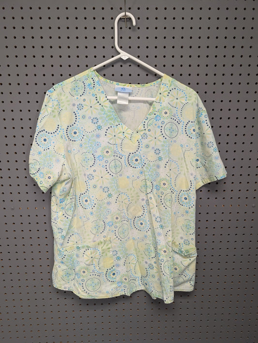 Front view of SB Scrubs geometric floral scrub top