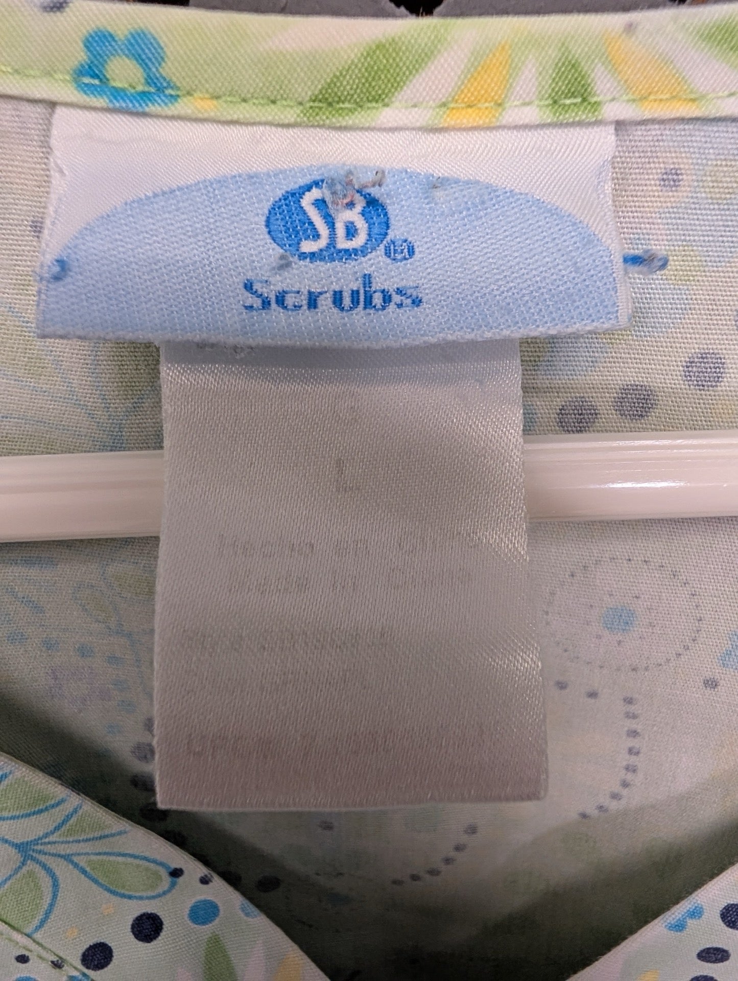 Tag showing SB Scrubs and Size Large