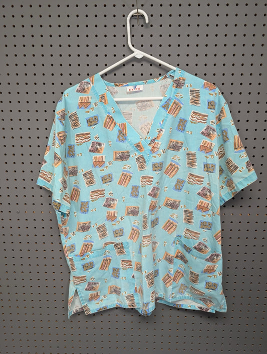 Front view of EXPO vintage geometric scrub top