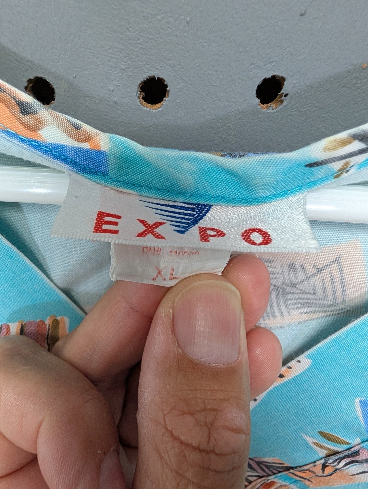 Tag showing EXPO brand and size XL