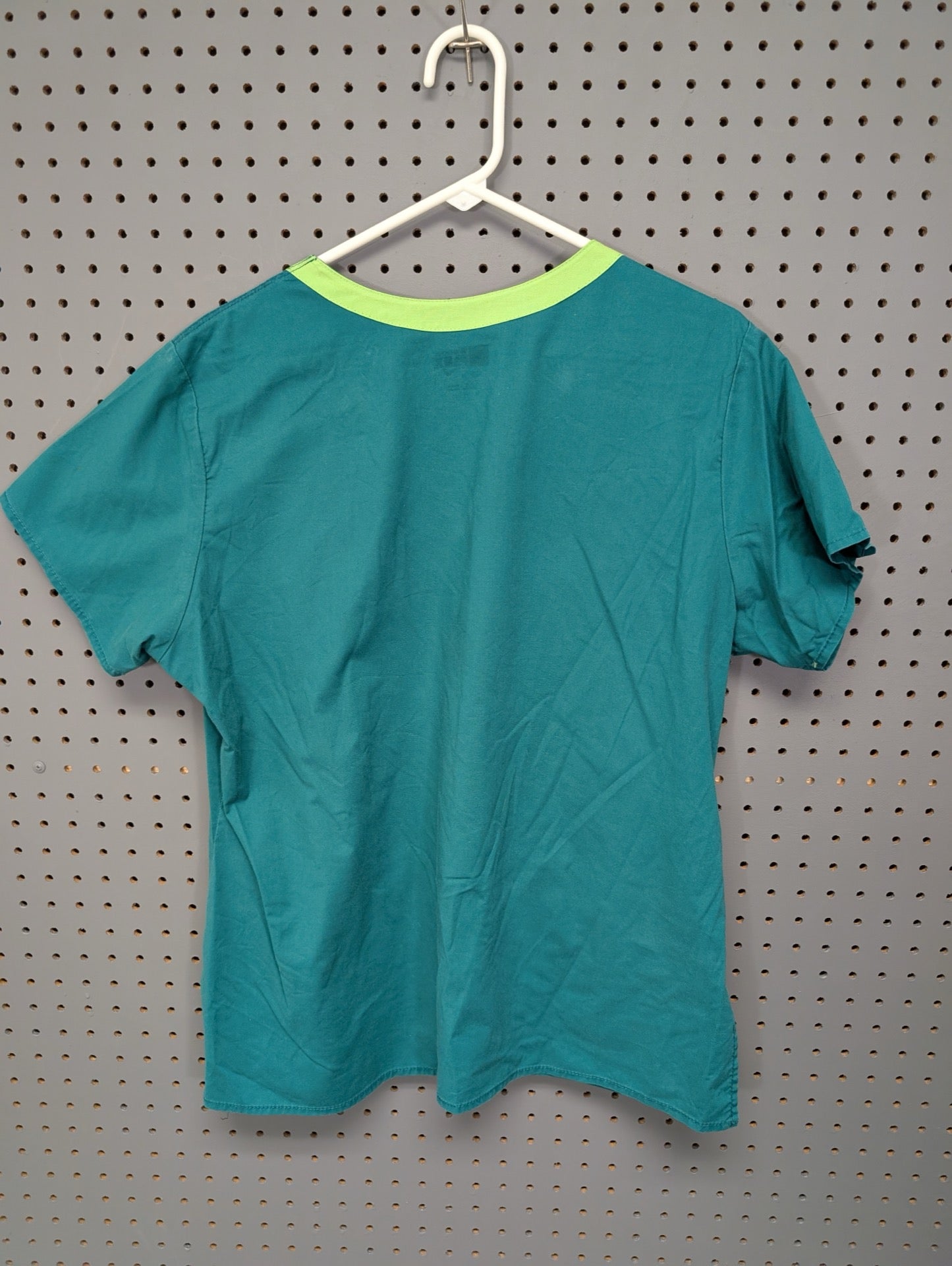 Back view of teal WonderFLEX scrub top