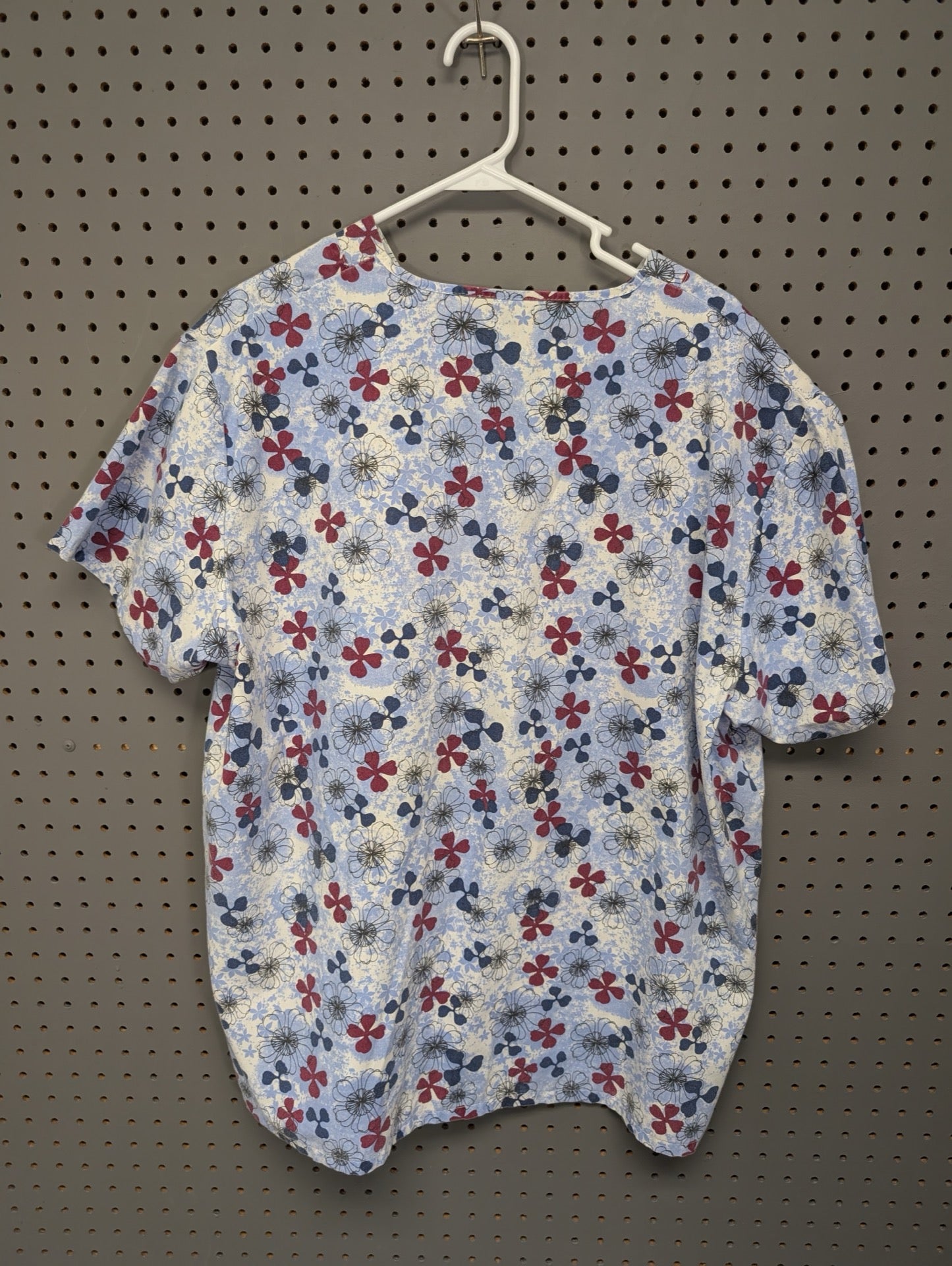 Back view of Absolute floral scrub top