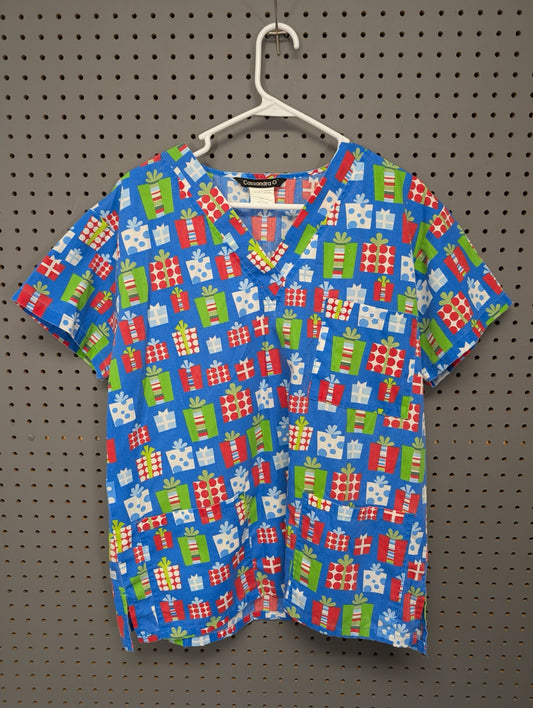 Front view of Cassandra O Christmas present scrub top