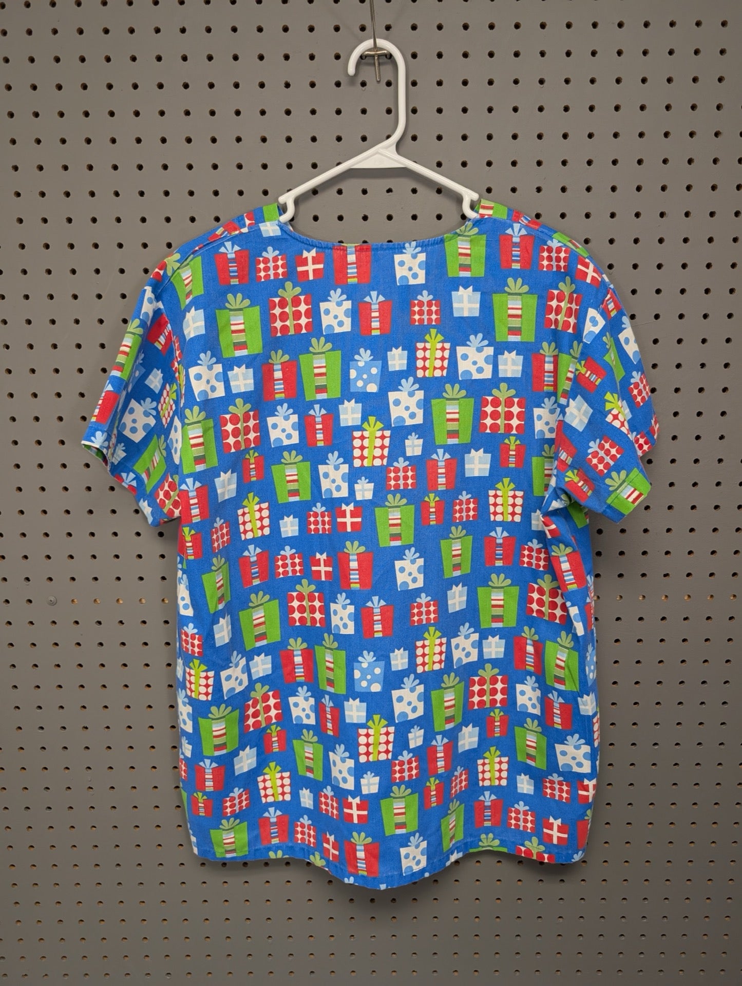 Back view of Cassandra O Christmas present scrub top
