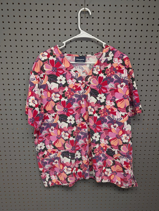 Front view of Absolute pink floral scrub top