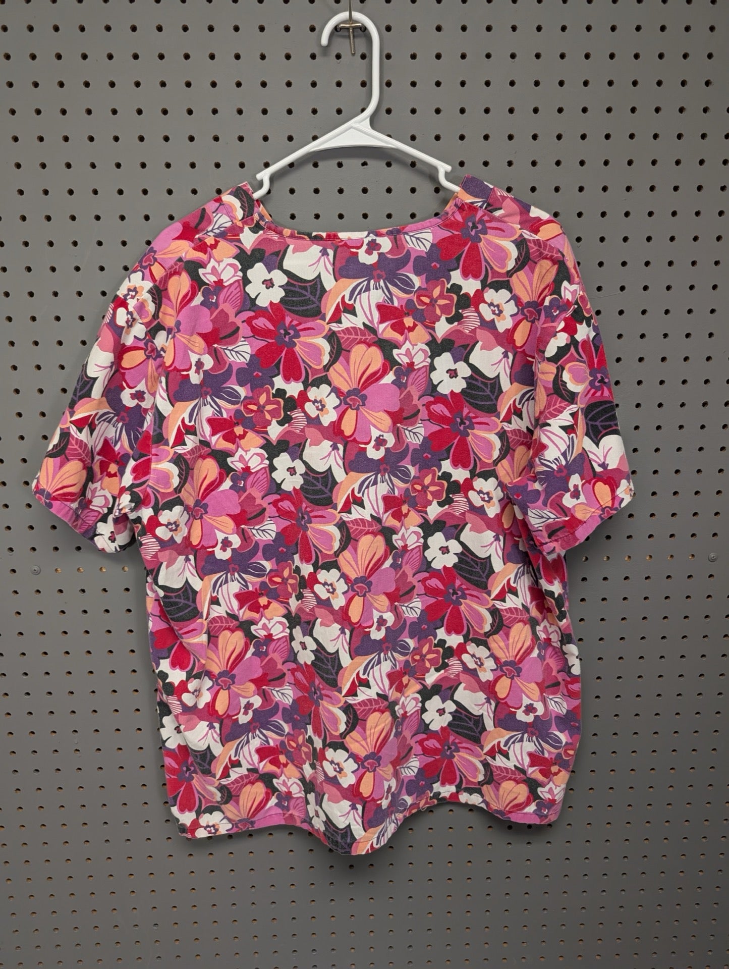 Back view of Absolute pink floral scrub top