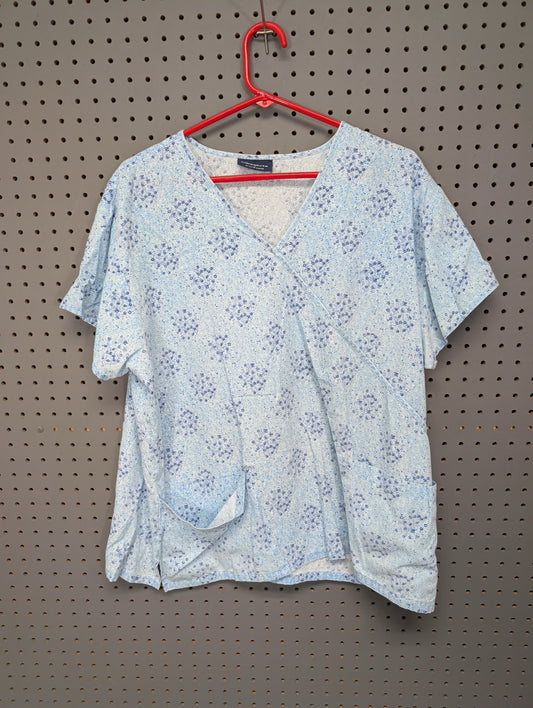 Front view of Absolute light blue faux wrap scrub top