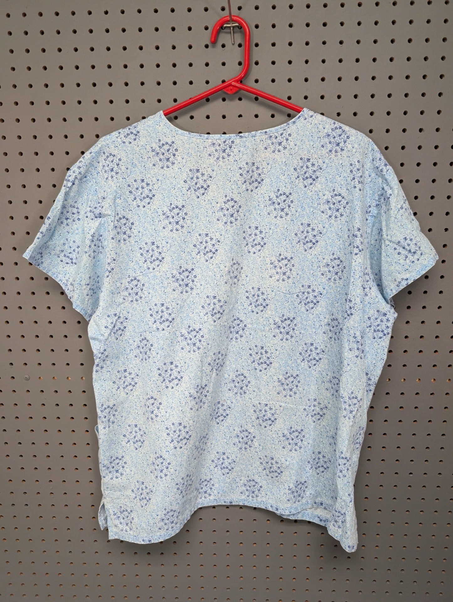 Back view of Absolute light blue scrub top