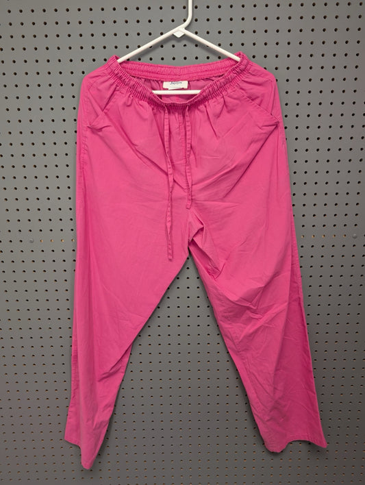 Front view of Jaylyn bright pink scrub pants