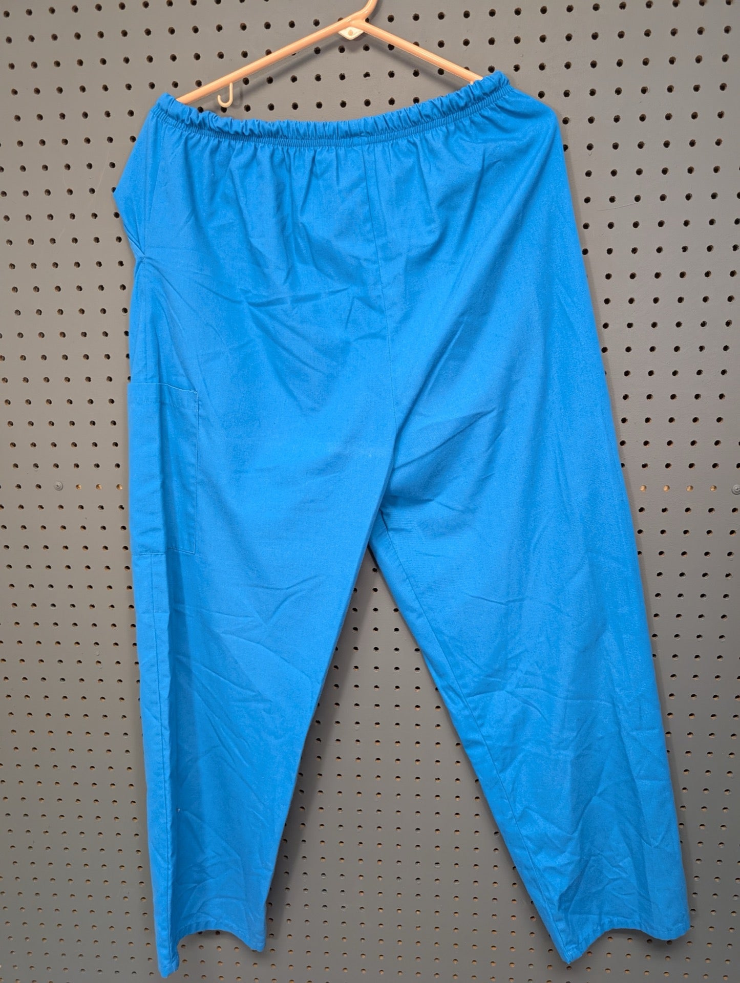 Back view of Cassandra O blue scrub pants