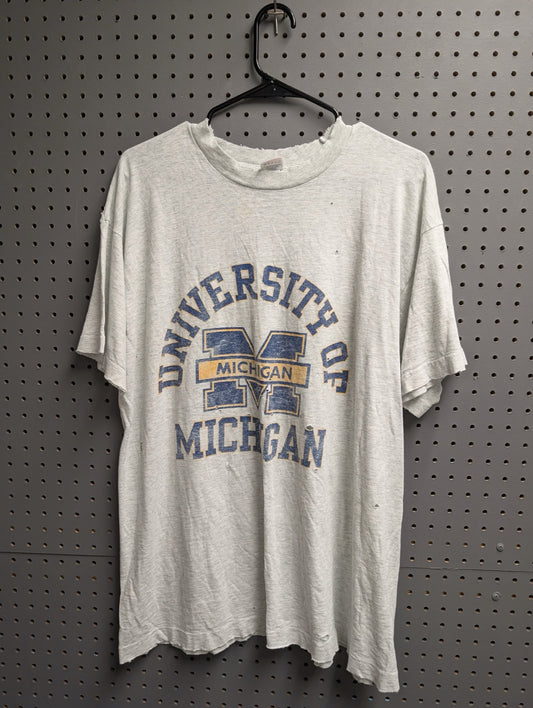 Front view of distressed University of Michigan grey vintage t-shirt