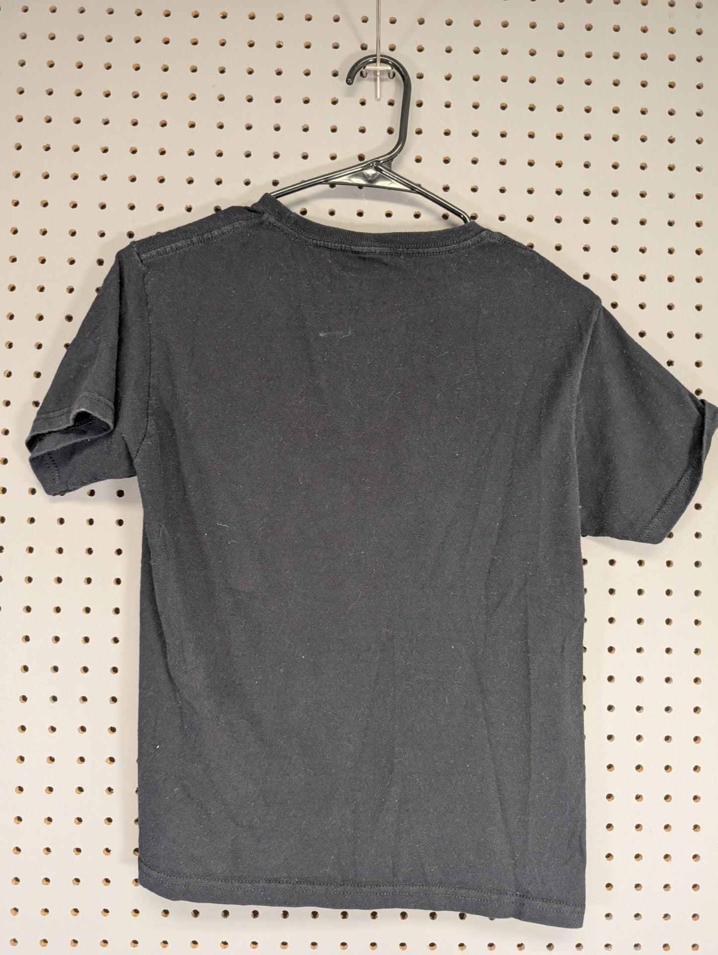 Back view of plain black youth Barbie t-shirt