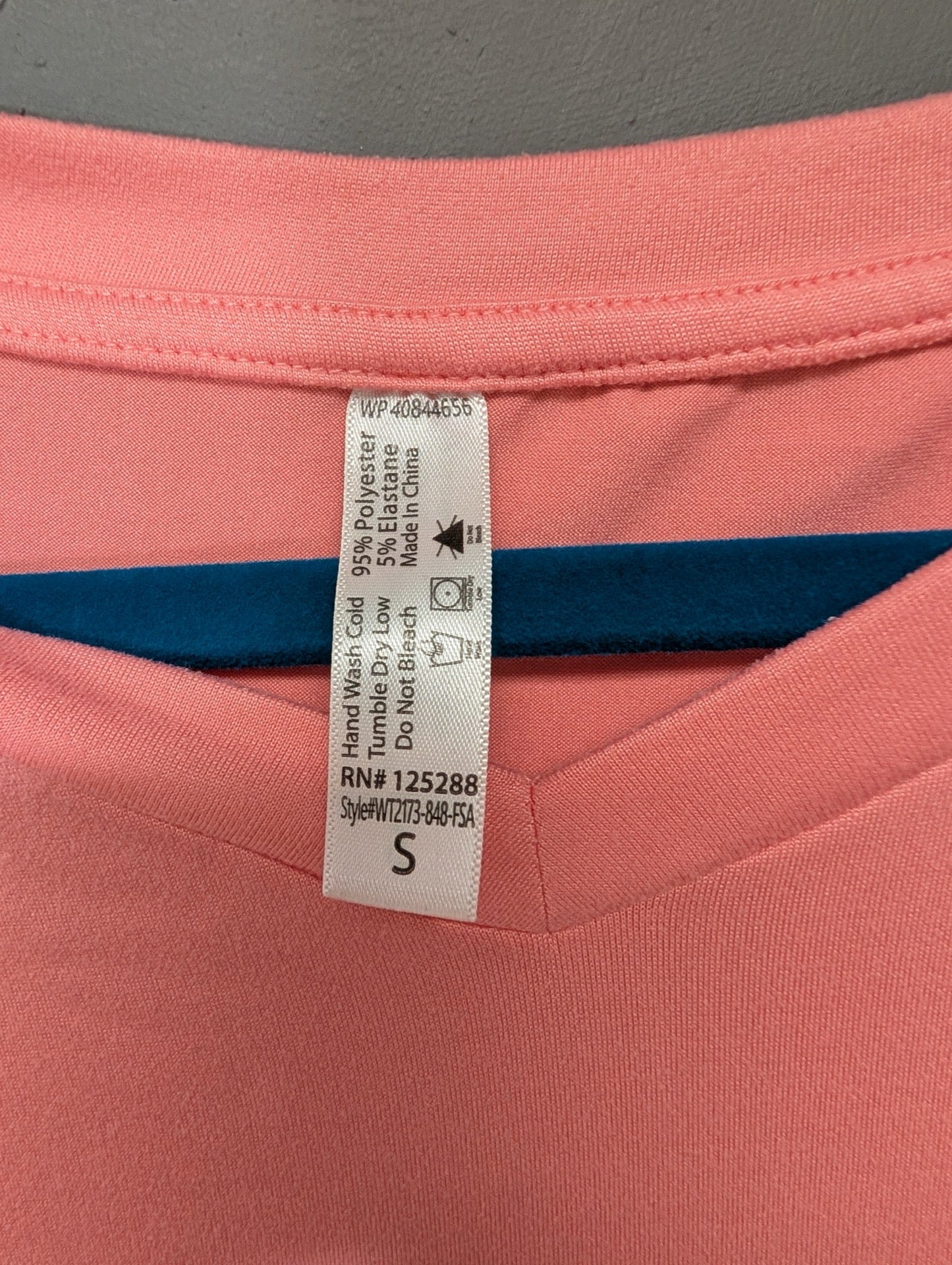 Inner tag showing size small and fabric blend