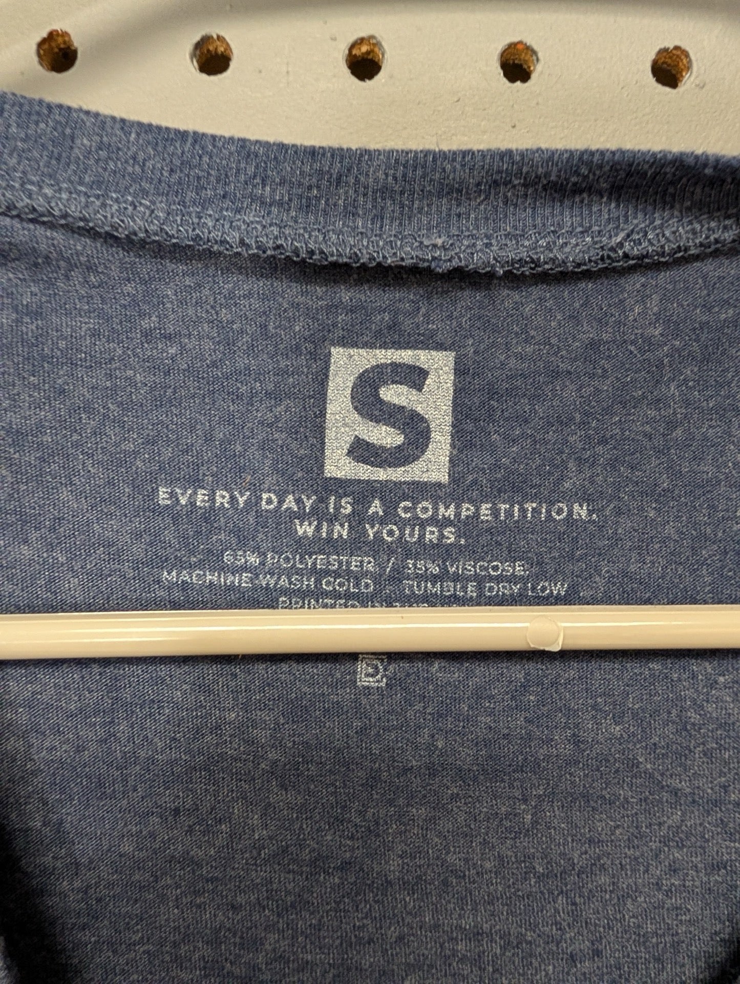 Printed inner tag showing size small