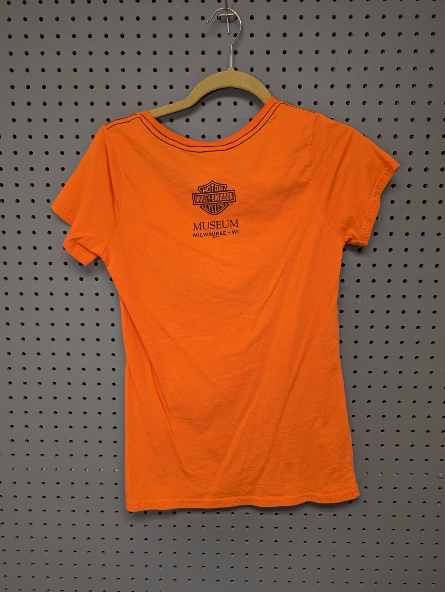 Back view of orange Harley-Davidson Museum t-shirt