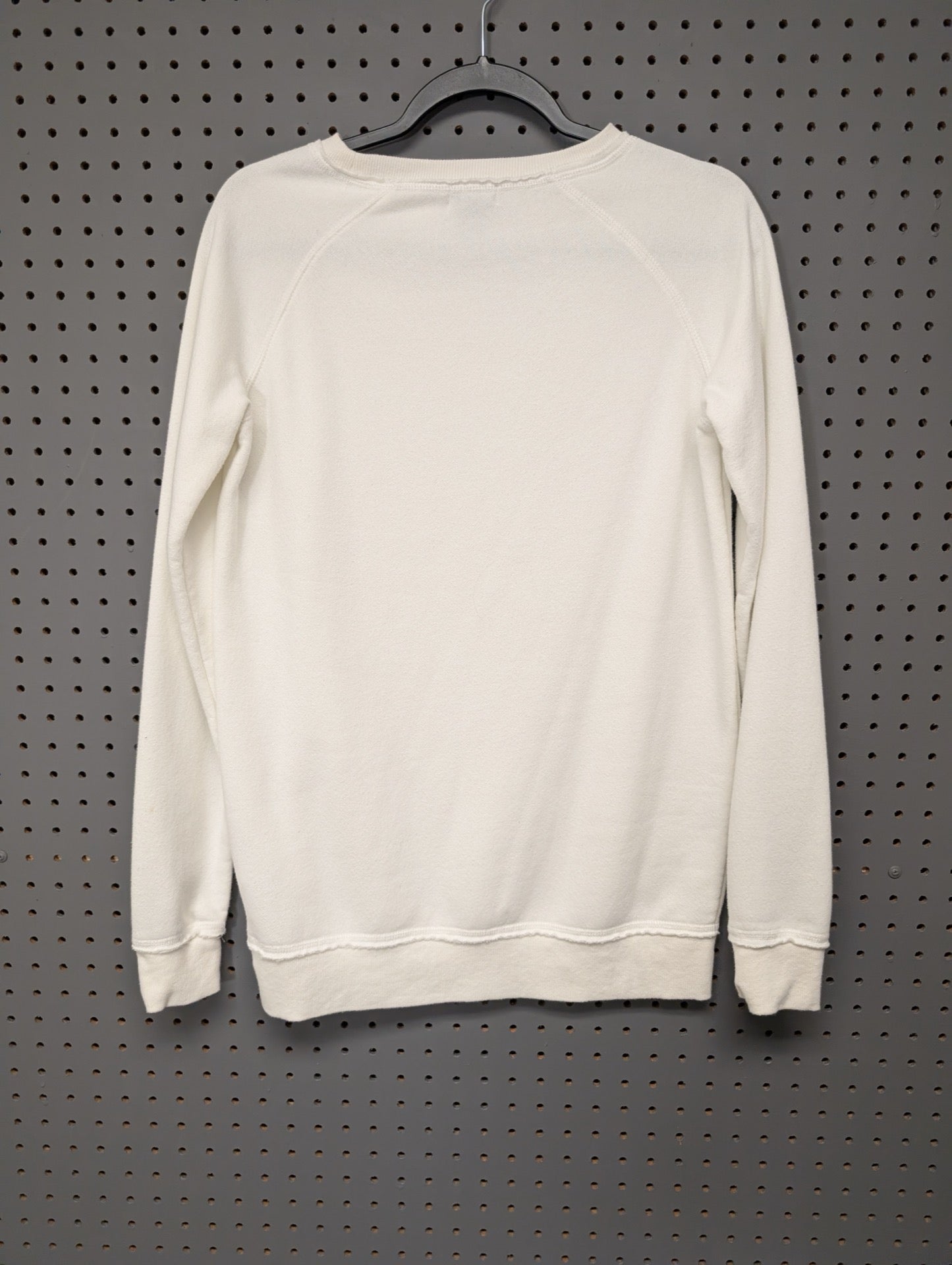 Back view of plain cream sweatshirt