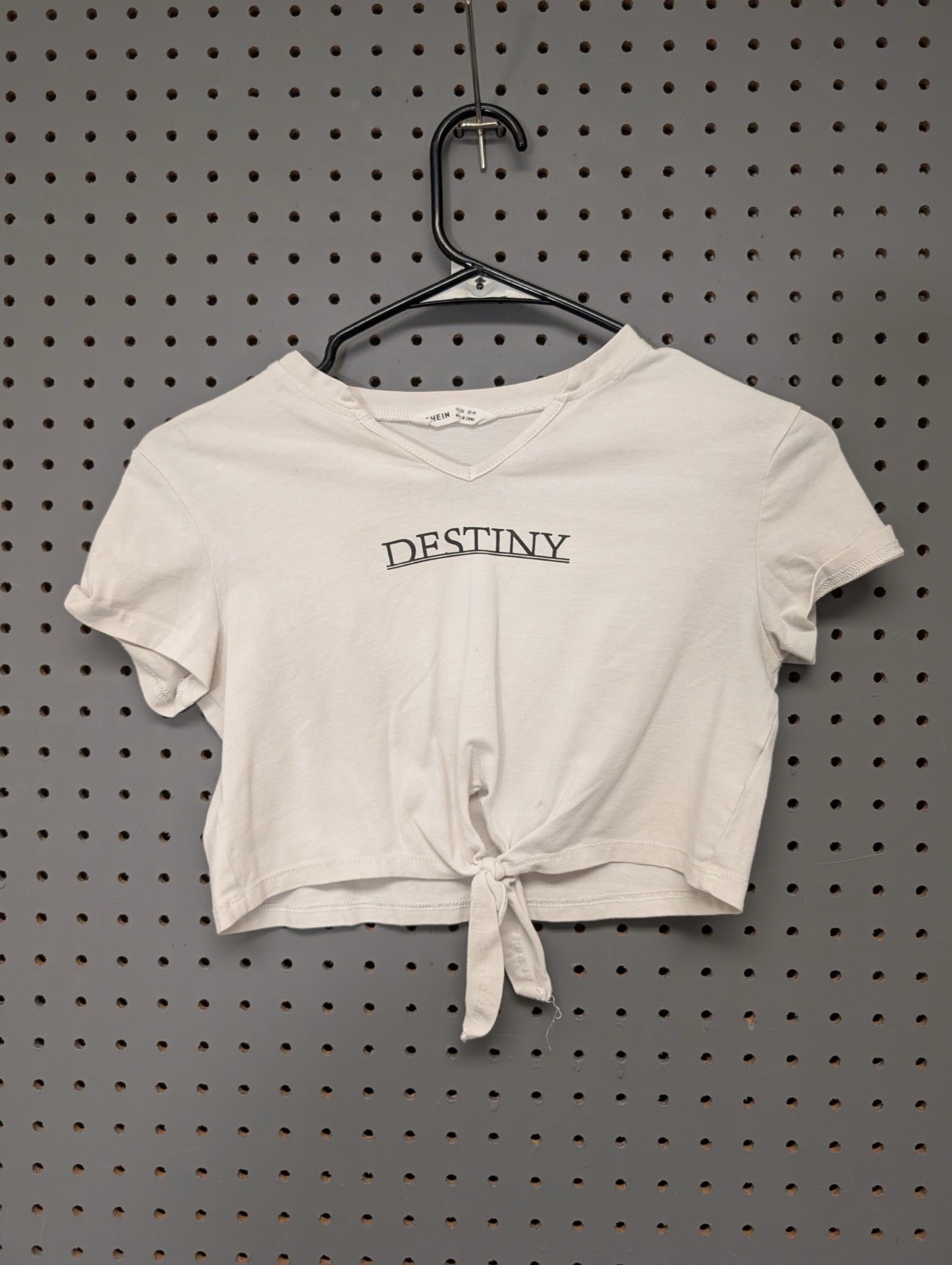 Front of white SHEIN tie-front crop top with Destiny graphic