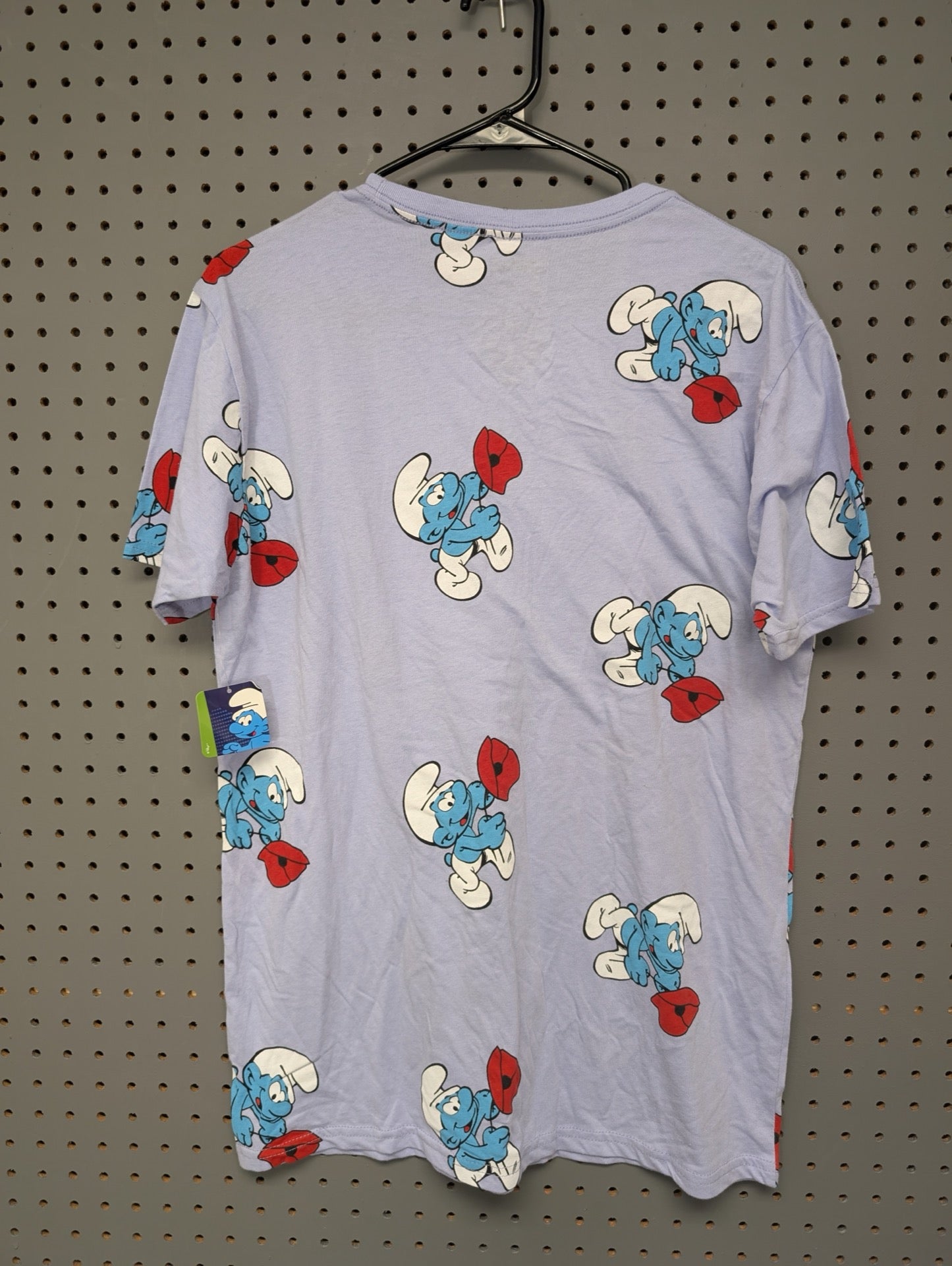 Back of Smurfs t-shirt showing NWT tag