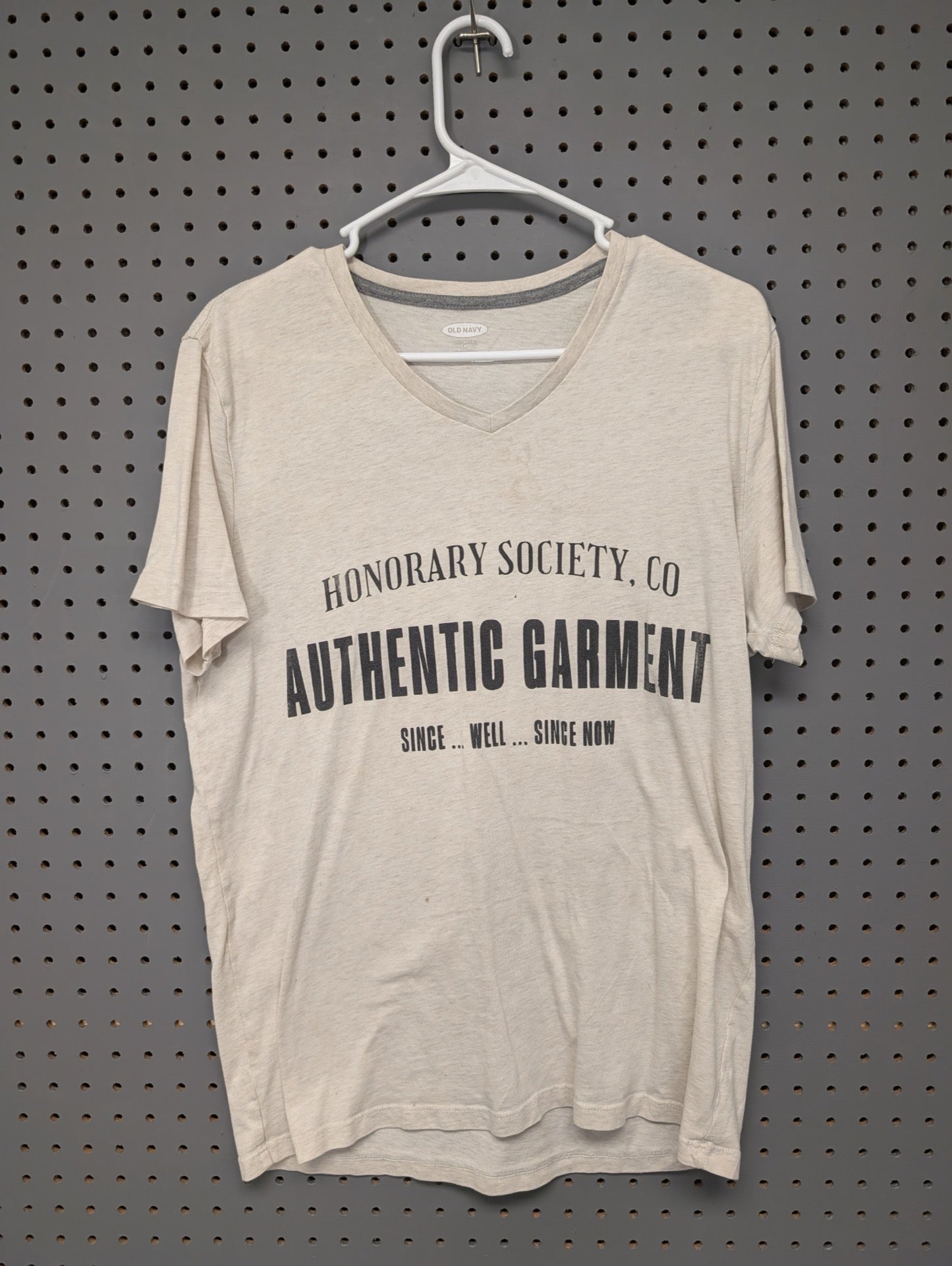 Front of beige Old Navy graphic v-neck tee