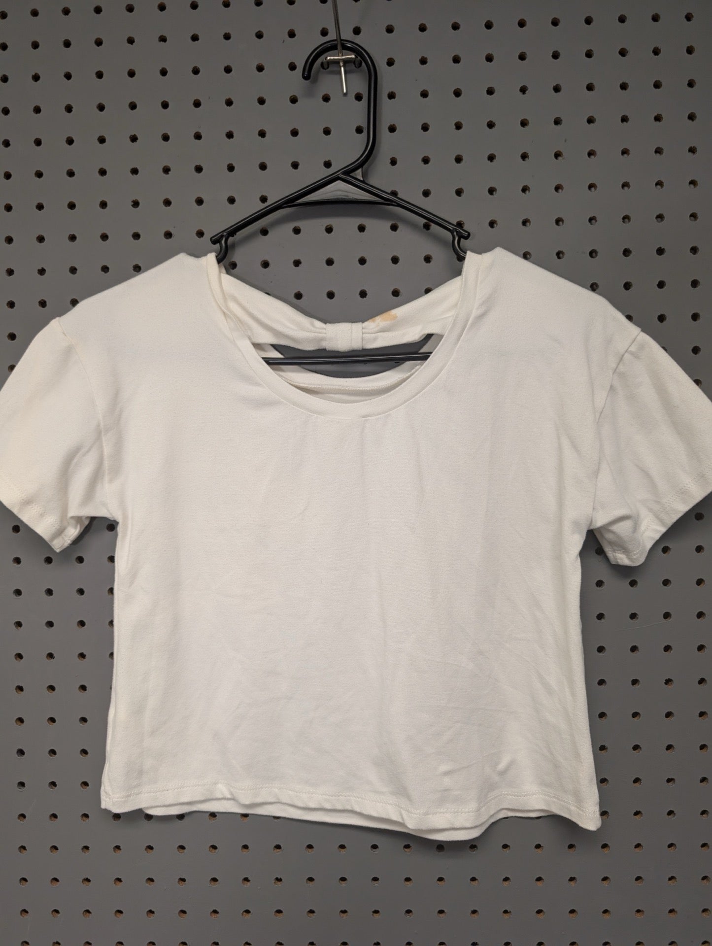 Back of crop top showing cut out twist detail