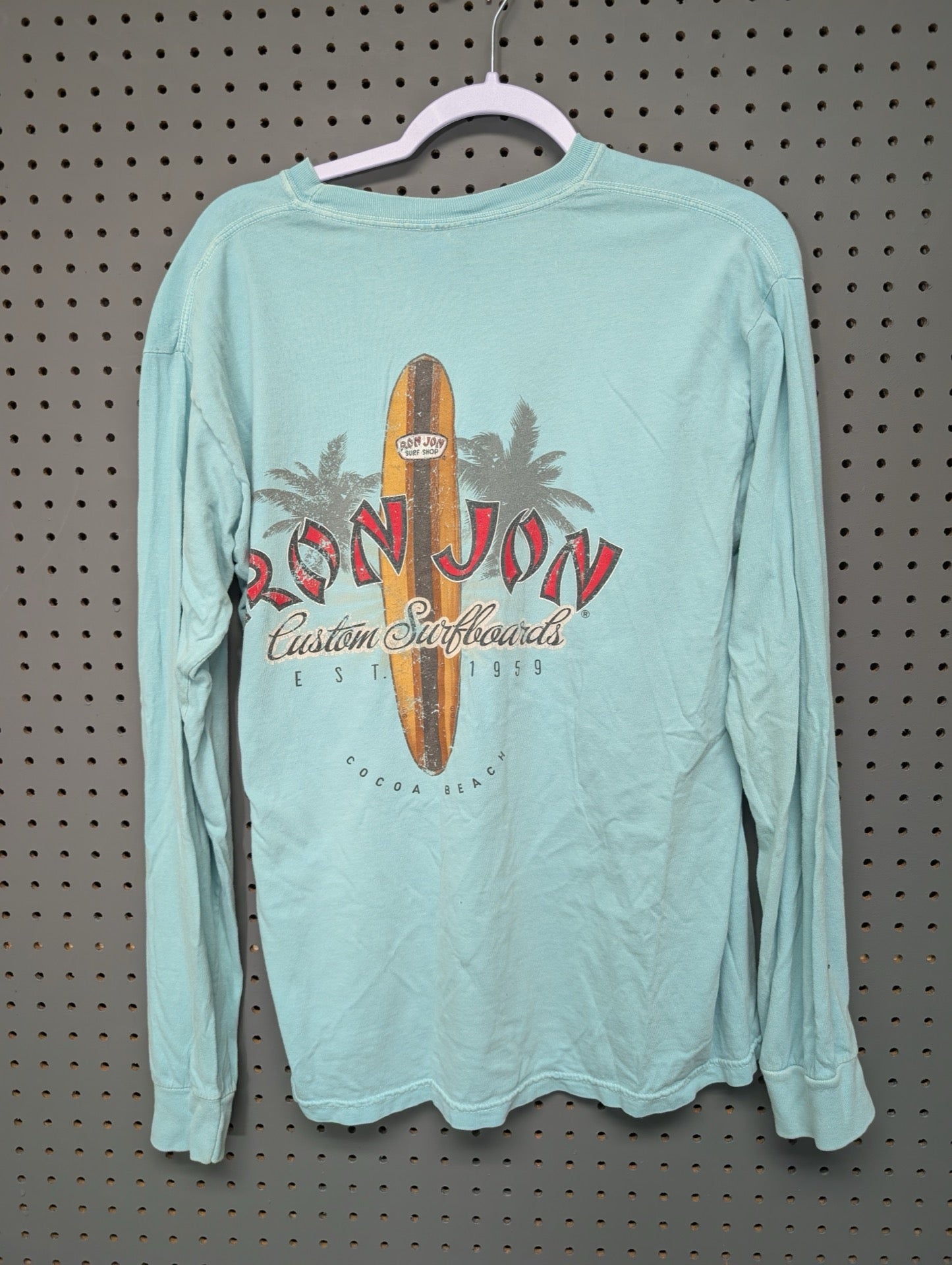 Back of Ron Jon shirt with custom surfboards graphic