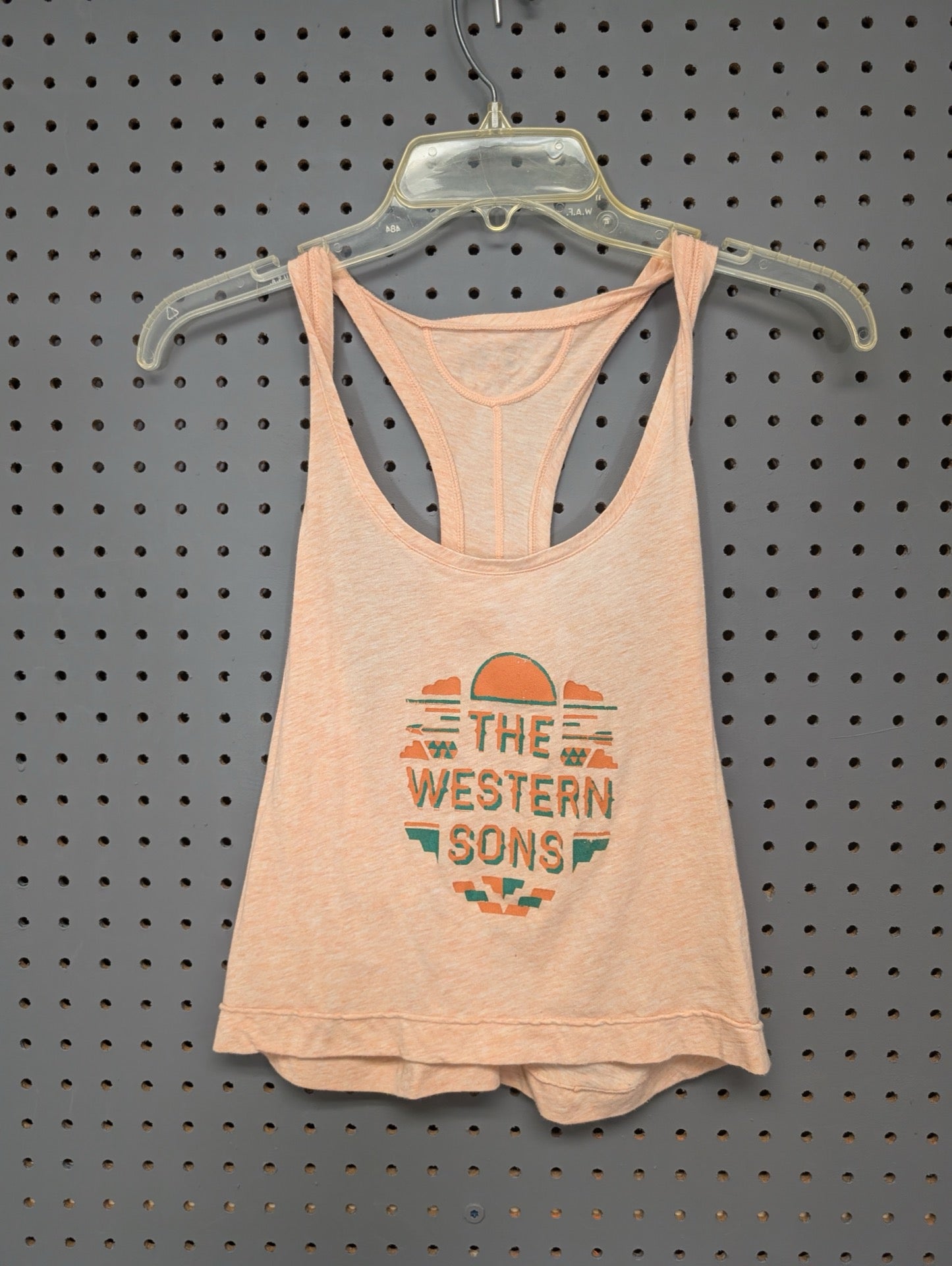 Front of peach Under Armour tank with The Western Sons graphic