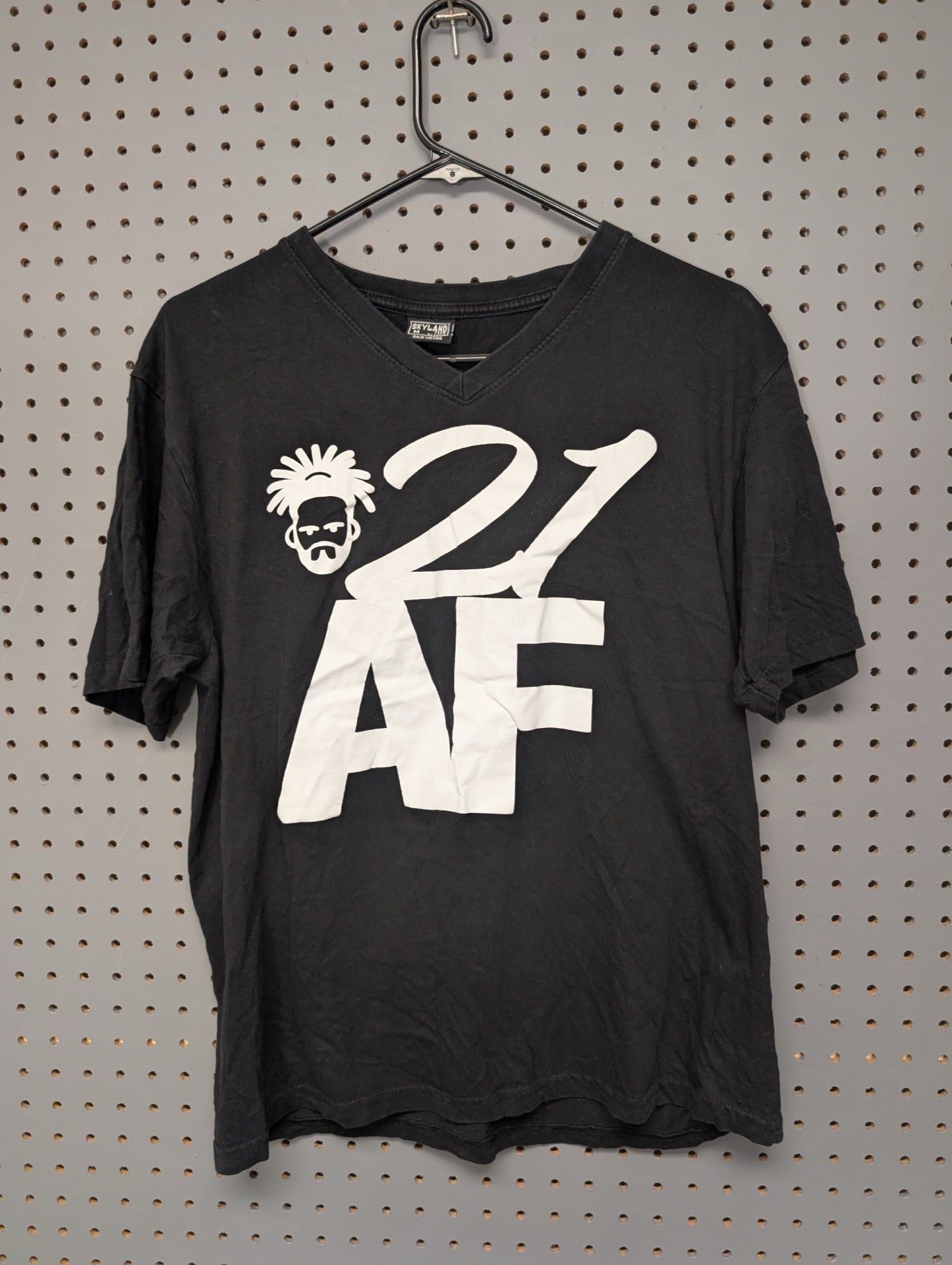 Front of black v-neck shirt with 21 AF graphic