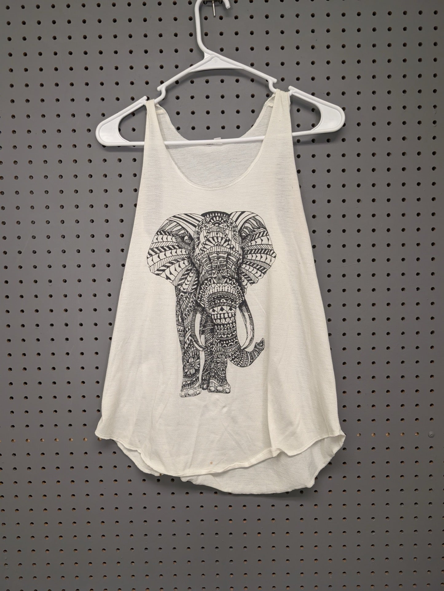 Front view of white tank top with elephant graphic