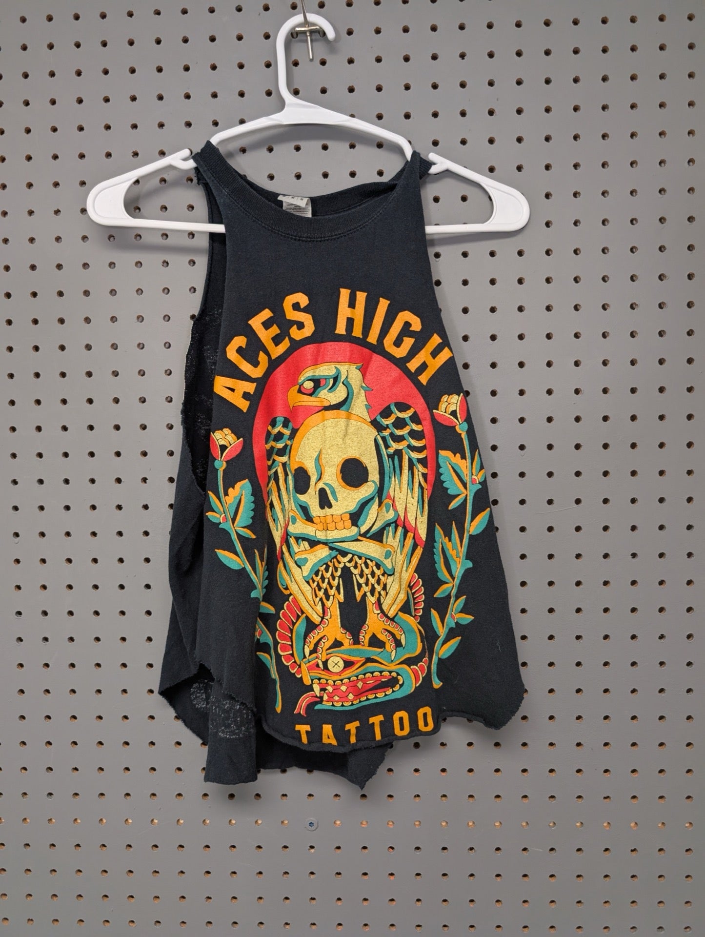 Front of black sleeveless tee with skull and eagle graphic