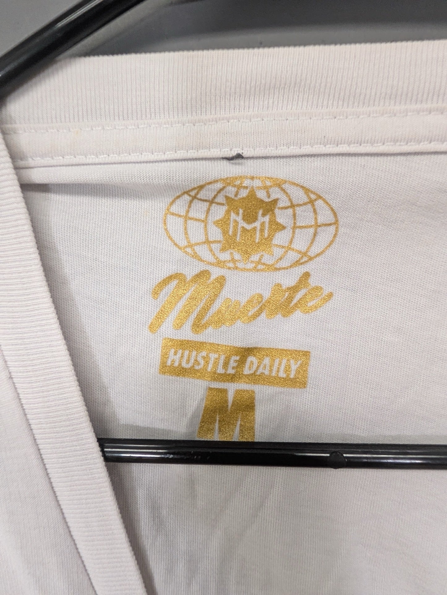 Muerte Hustle Daily size medium printed tag