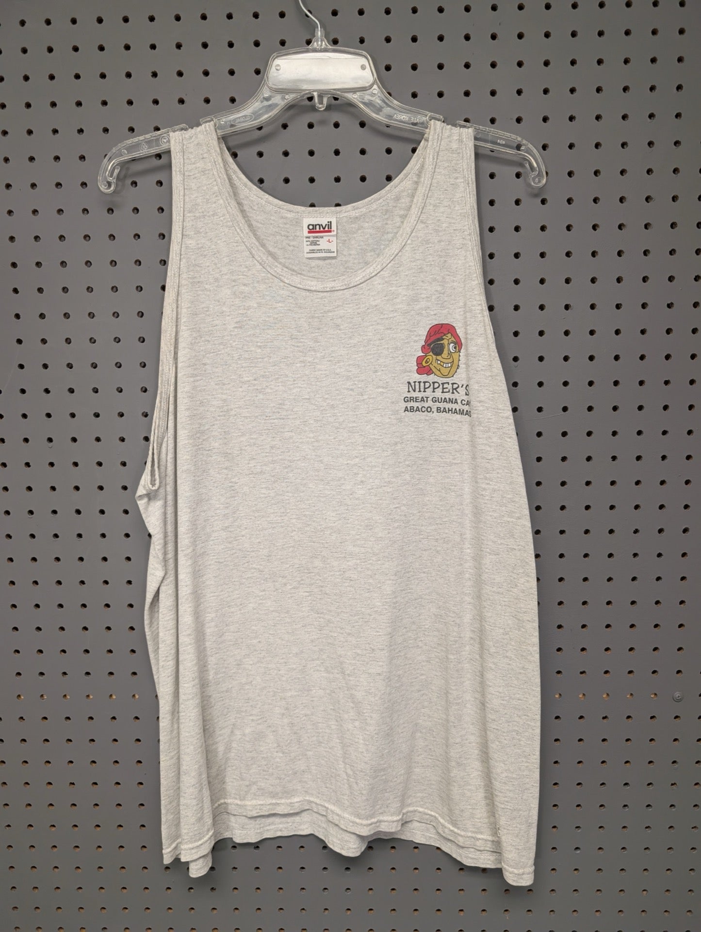 Front of gray tank top with small Nipper's pirate logo