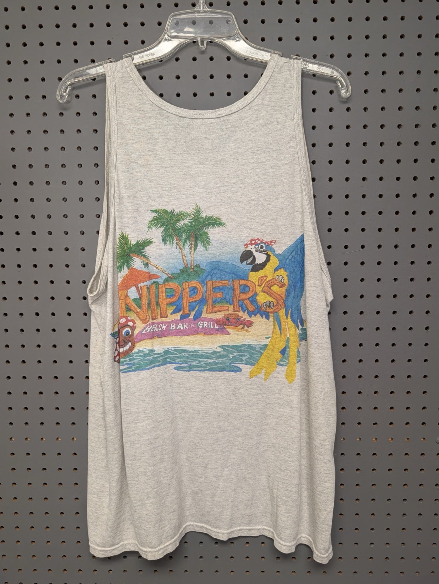 Back of tank top showing large Nipper's beach parrot graphic