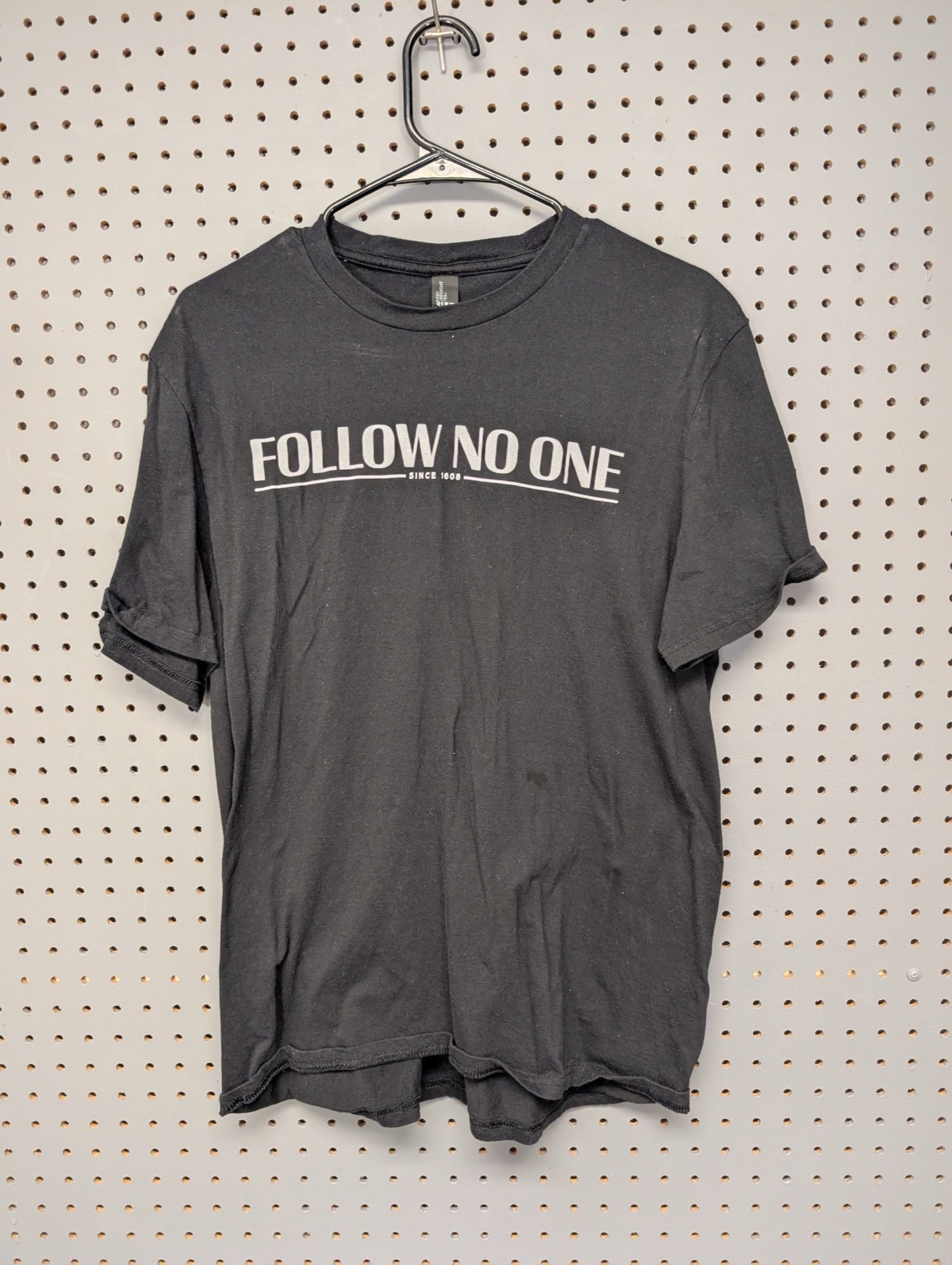 Front of black Bushmills Follow No One t-shirt