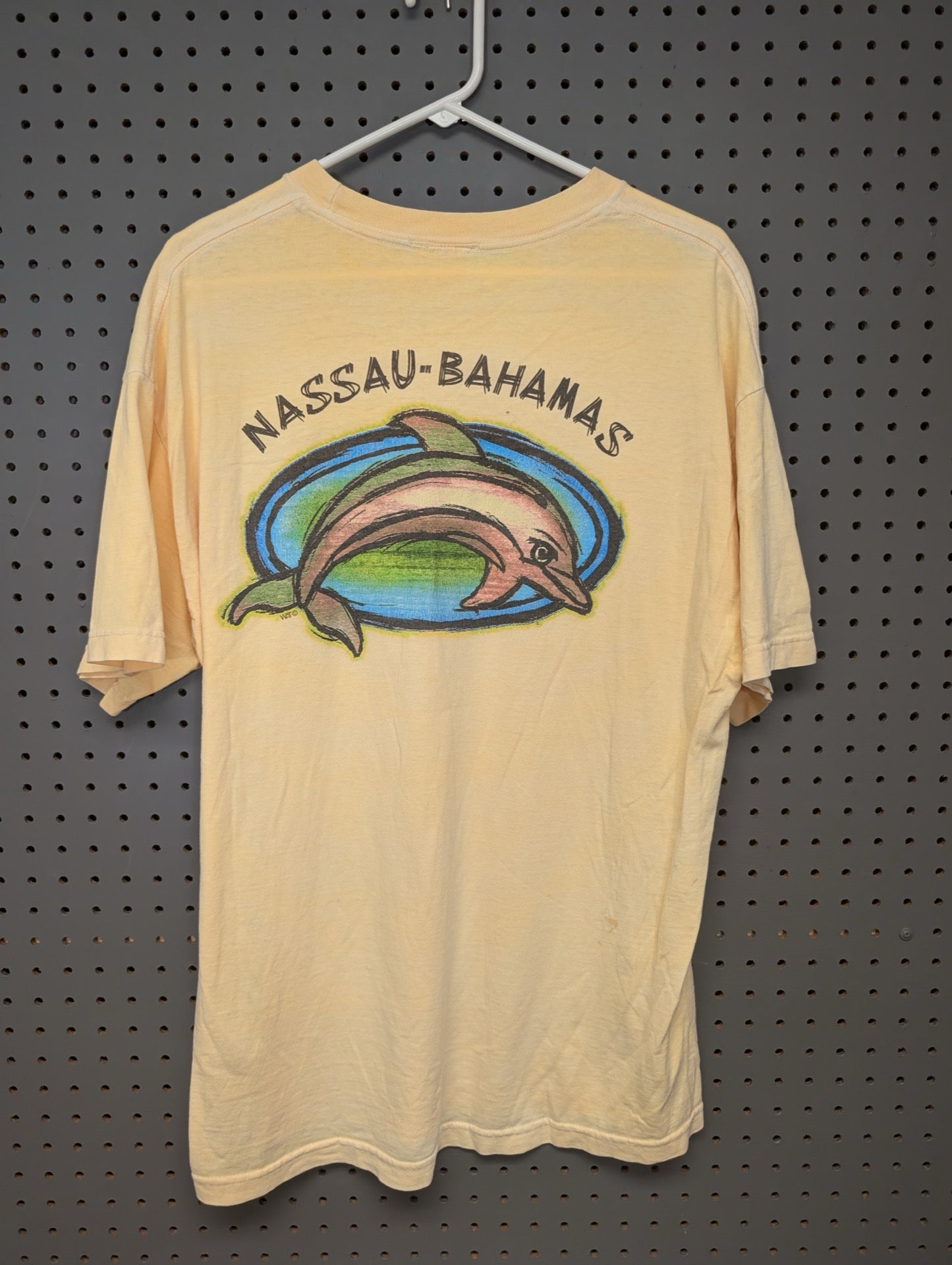 Back graphic of dolphin on yellow Bahamas tee