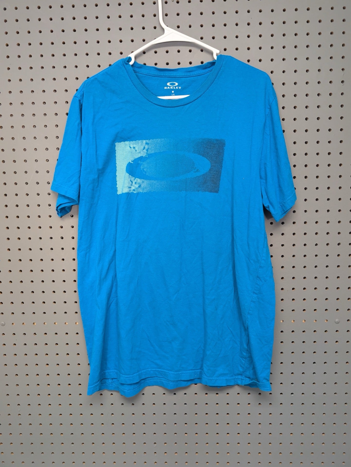 Front of light blue Oakley t-shirt