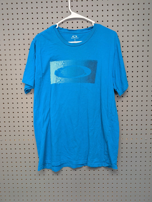 Front of light blue Oakley t-shirt