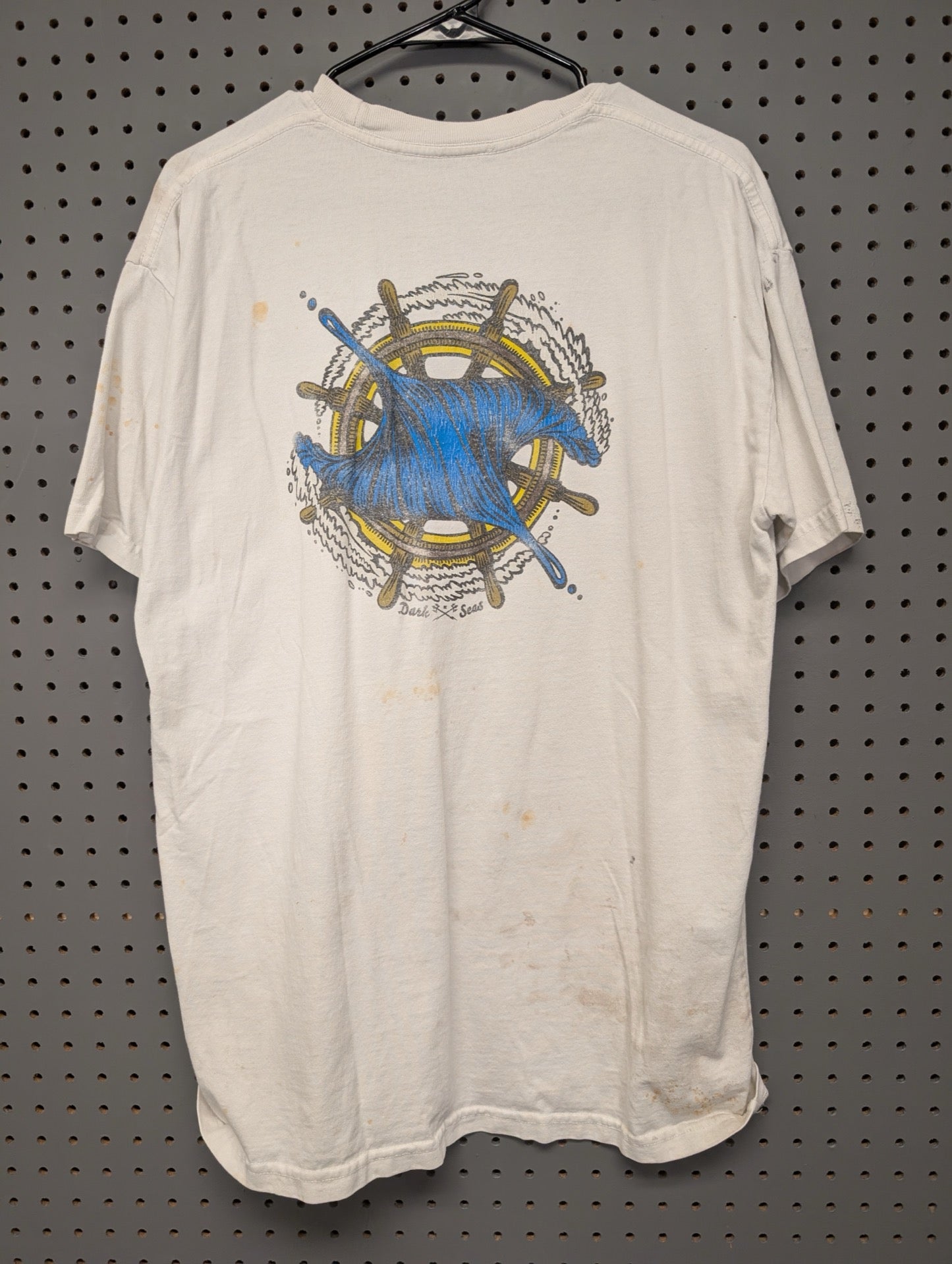 Back of shirt with ship wheel graphic
