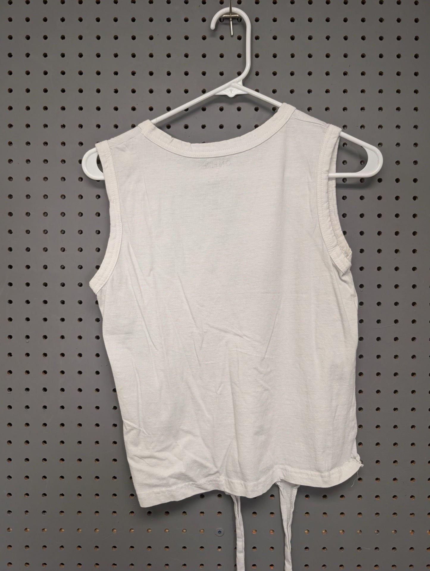 Back of white tank top
