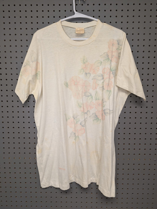 Front of vintage cream t-shirt with pastel floral print