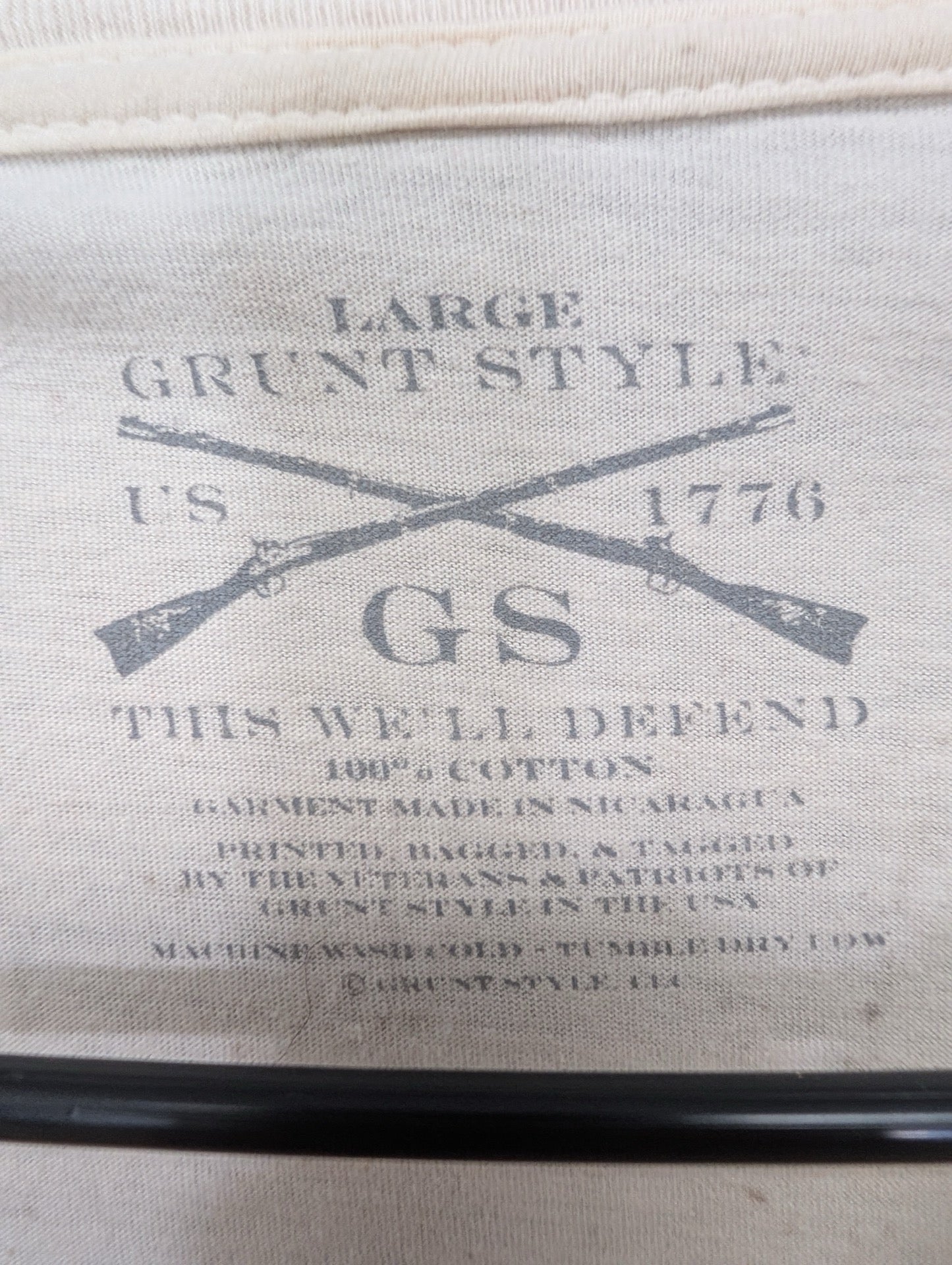 Close up of Grunt Style tag inside shirt