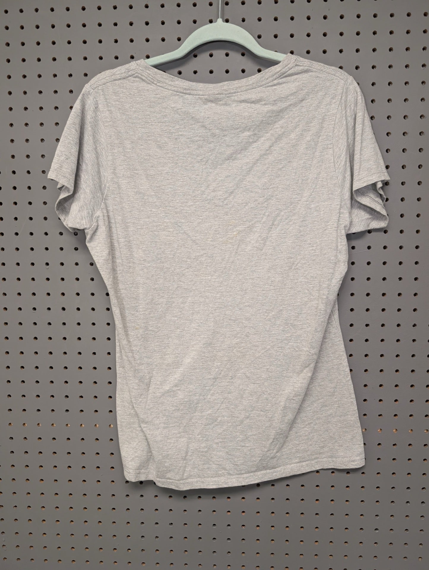 Back of grey v-neck t-shirt