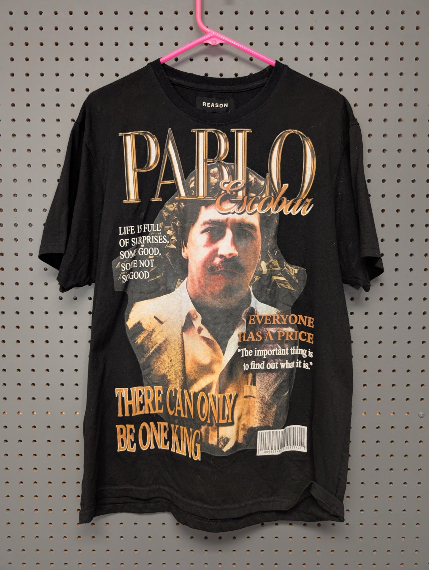Front of black Reason t-shirt with Pablo Escobar graphic